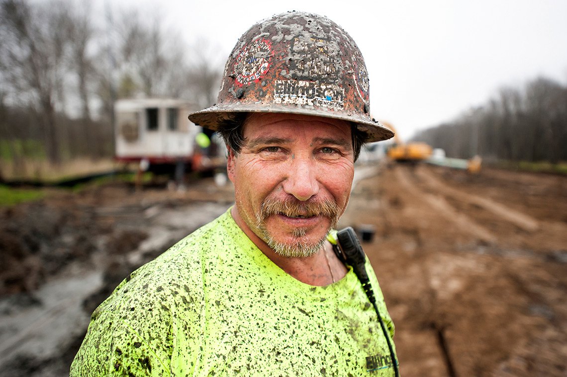 Industrial photo of an oil pipeline worker