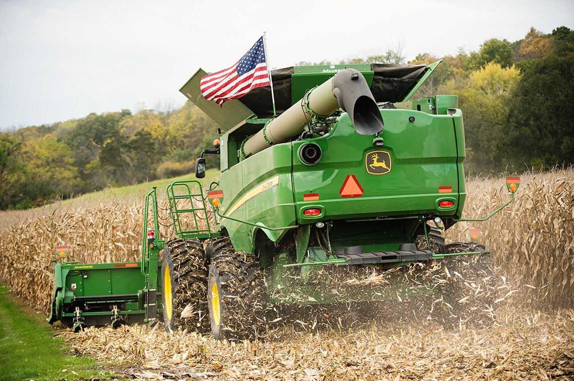 A John Deere combine harvest corn in Rochester, Minnesota