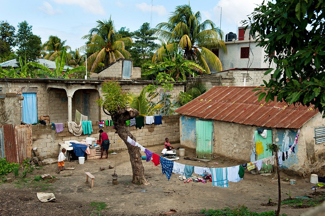 A typical house and yard in Fort Liberte Haiti.