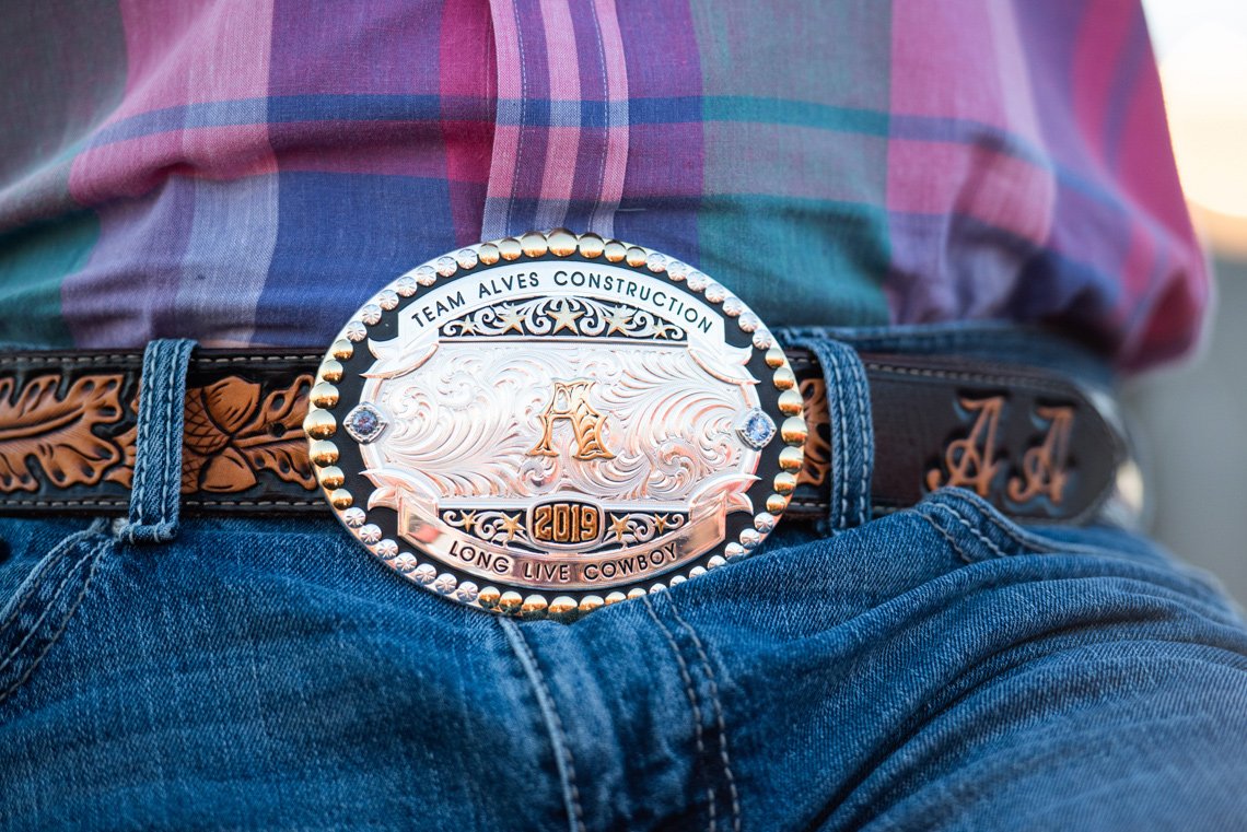 Bullrider's belt buckle at Rochester mn rodeo - editorial photo